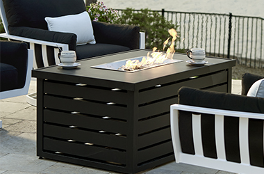 black table with rectangular fire pit in the center