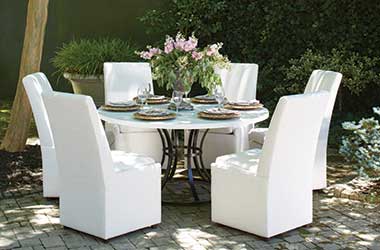 outdoor dining table surrounded by 6 chairs