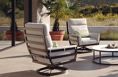  patio with four cushioned chairs around a table in the center