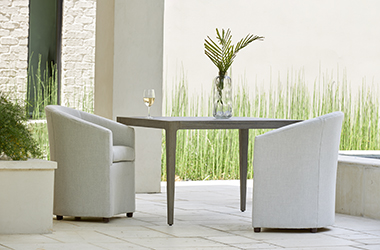 dark wooden dining table with two chairs